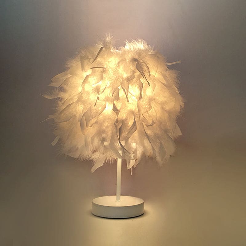 FederLeuchten - Elegante Feder Tischlampe in Kugelform